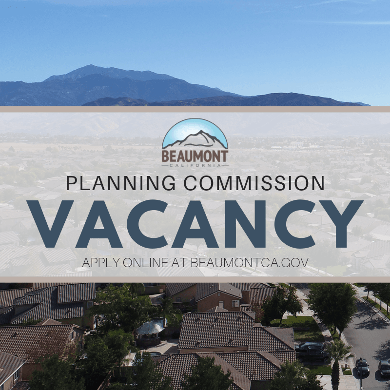 Aerial photo of residential area with words Planning Commission Vacancy